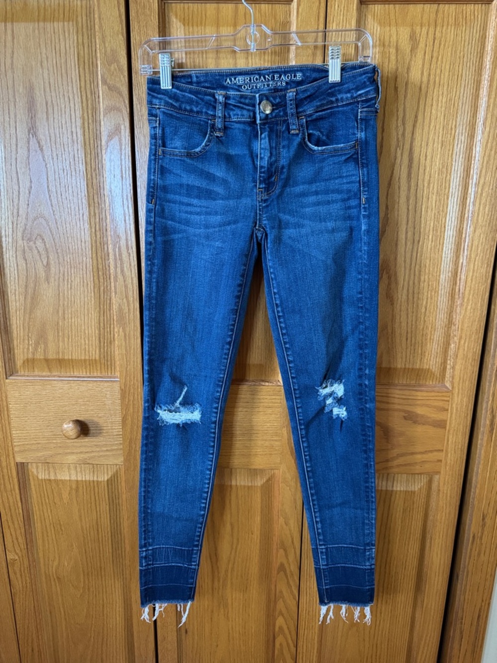 American Eagle Outfitters Medium-Dark Blue Skinny Jeans with Knee Distress